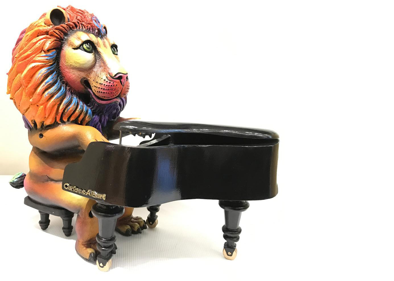 Signed, limited edition lion piano player sculpture